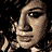 A 3x3 contact sheet of animated frames from a Kelly Clarkson-themed AIM buddy icon featuring close-ups of facial features, an eye with star symbol, and text elements.