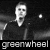 Black-and-white animated sequence showing a person playing electric guitar on stage with bright lights, repeated across multiple with text "greenwheel" below each