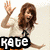 Two side-by-side pixelated images of a woman with long brown hair, one waving and the other holding a microphone, both labeled with text below.