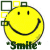 Two side-by-side animated frames of a yellow smiley face icon with green and yellow square accents, showing slight color variations between frames.