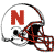 Pixelated image of a white football helmet with a large red 'N' on the side, featuring brown and gray accents and a black face mask.