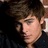 A pixelated image shows a person with brown hair on the left, next to yellow text reading 'Zac and Priyanka 4eva <33333' on a blue background.