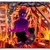 A pixelated static image shows a figure in purple clothing against a fiery orange and red background with scattered dark and light brown tones.