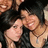 Two figures in close physical contact, one with light skin and dark hair embracing another figure with lighter skin tone.