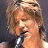 A 48x48 pixel buddy icon featuring a split composition with a person singing on the left and green text on a dark background on the right, displayed as part of an animated contact sheet.