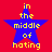 Four identical blue stars on red background with yellow text reading "in the middle of hating" arranged in a