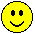 Four yellow circular pixel art faces with black outlines, each displaying distinct facial features against a gray background.