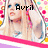 A pixelated image of a person with long blonde hair, wearing a white top, against a colorful polka-dot background with pink, blue, yellow, and red dots.
