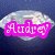 A diamond-shaped icon with a blue background, featuring a pink text overlay that changes between frames.