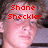 A pixelated image of a person with curly hair, featuring red text overlays reading "Shane Sheckler" on the left and "so hot" on the right.