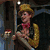 Six distinct character and object images arranged in a , including a puppet, a person with dark hair, a person in a white hat, a smiling person, red lips, and a person with brown hair