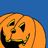 Pixelated orange pumpkin face with carved triangular eyes, a small nose, and jagged mouth against solid blue background.