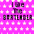 A static image with a bright pink background covered in white star patterns, displaying repeated text "I like The BARTENDER" in black pixelated font.
