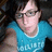 A static image with a teal background divided into four sections containing pixelated text and a small photo of a person in a blue shirt.
