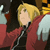 Pixelated image of a character with blonde hair wearing a red jacket over black clothing, holding an object in the left hand against a dark background.