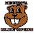 Pixelated brown cartoon animal head with large white teeth, black eyes, and a wide smile, framed by partial text above and below.