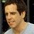 A contact sheet of two animated frames showing a person in profile and red text reading "Along Came Polly" on the right side.