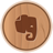 Brown elephant head icon on light brown circular wooden background with visible grain pattern.