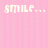 Pixelated text on pink background with gray rectangle, reading 'smile...', 'it looks good', and 'on you' in white block letters.