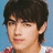 A pixelated image of a person with dark hair and a red-and-white checkered shirt against a light blue background, with the text "HOTTIE!" overlaid on the right side.