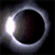 Four quadrant shows celestial and text elements: solar eclipse, star field, purple planet, and 'Dark Night Int.' text over eclipse