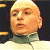 A pixelated contact sheet showing two frames of an animated icon featuring a bald character in white and gray attire on the left, with green text reading "Original Icons .com" on a dark background to the right.
