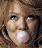 Pixelated close-up of a person's face with visible eyes, nose, and mouth area showing a bubble-like shape in the lower center.