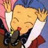 Pixelated anime-style character with closed eyes, blonde hair, and a white shirt with dark collar, set against a blurred background of pink and blue tones.