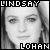 Black-and-white pixelated image of a person with long hair, overlaid with red X marks and text labels reading LINDSAY and LOHAN.