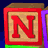Colorful wooden blocks with letters N, O, E, L arranged in two configurations against a blue background.
