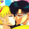 Two anime-style characters in close embrace, one with blonde hair and a red headband, the other with dark hair and glasses, under a blue sky with a purple heart icon.
