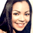 Static 48x48 pixel icon showing a close-up of a person with long dark hair and light skin, smiling slightly against a plain background.