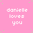 Pink background with repeated white text 'danielle loves you' in pixelated font, scattered green dots, and a solid gray rectangle in bottom-right corner.