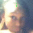 A pixelated image of a person with green text appearing sequentially over their head.