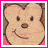 Animated cartoon character with light brown fur, dark eyes, and a smiling mouth; first frame shows full face, second frame has right eye closed in wink.