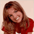Static 50x50 pixel buddy icon showing a woman with long brown hair wearing a red top against a light background.