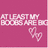 Pink background with pixelated white text reading 'AT LEAST MY BOOBS ARE BIG' and a small heart symbol below the text.