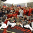 Pixelated image with red background displaying "CARDINALS ROCK!!!!!!!!" text and indistinct figures in red and white attire.