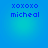 Blue gradient background with four identical pixelated text blocks reading 'xoxoxo' above 'micheal'.
