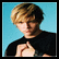 Two side-by-side pixelated frames of a young man with light brown hair in different poses against contrasting backgrounds, one blue and one brown.