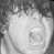 A 4x3 contact sheet of grayscale animated frames showing a person with curly hair shouting, accompanied by pixelated text phrases across the bottom rows.