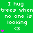 Green background with repeated white text "I hug trees when no one is looking" and pink heart symbols above a white '<3' symbol.