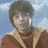 Static 48x48 pixel icon of a person with dark hair and glasses wearing a brown jacket over a red shirt against a blue sky background.