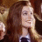 A pixelated image of a woman with long brown hair holding her hand near her face, next to green text reading 'Original Icons .com' on a dark background.