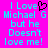 Pixelated cyan text on bright pink background reads "I Love Michael G but he Doesn't love me!" with a black heart symbol replacing the 'o' in Love.