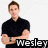 Pixelated image of a person in a black shirt with arms crossed, standing against a white background, with the name 'Wesley' displayed below.
