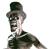 Pixelated grayscale image of a cartoon character wearing a top hat and dark clothing, viewed in profile against a white background.
