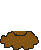 Pixelated cartoon character with brown fur and black outlines, standing on a cloud-like shape against white background.