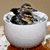 A four- shows a cup with dark liquid, a white duck, a duckling, and text reading "I Love Duckies!" on a green background