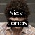 Four- shows a person with curly brown hair in a light-colored patterned shirt against a gray striped background, with text and symbol changes
